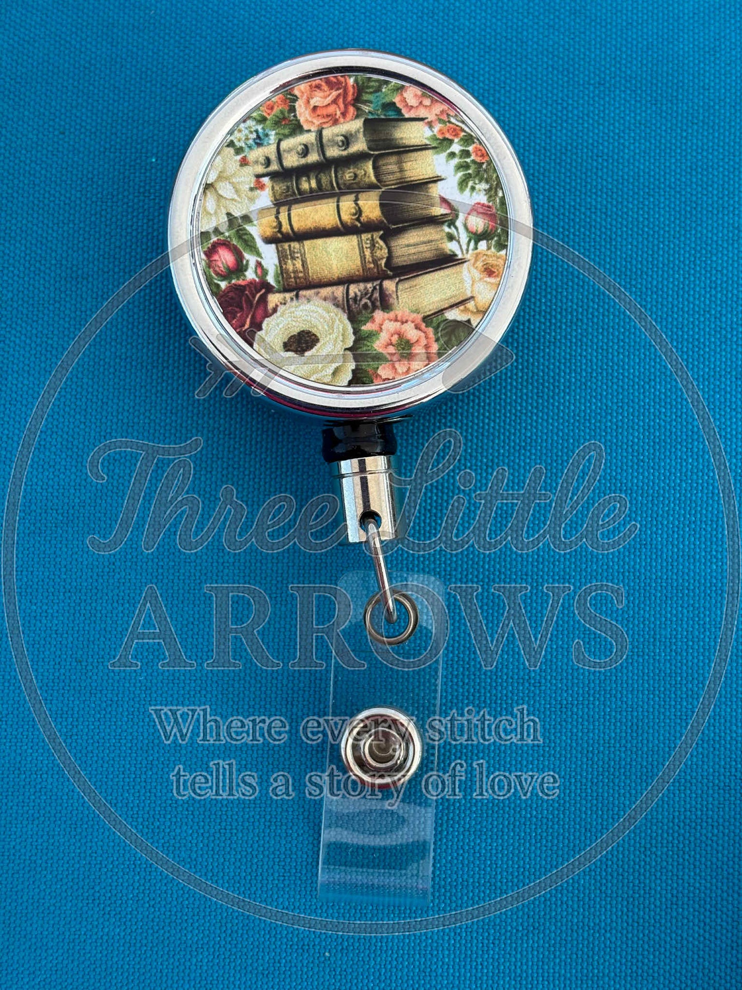 Floral Book Stack Badge Reel